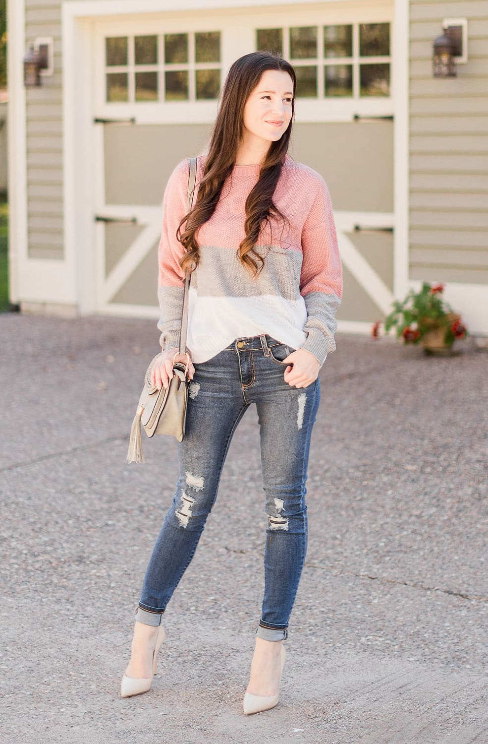 neutral color block sweater outfit by affordable fashion blogger Stephanie Ziajka from Diary of a Debutante, Chloe Hudson dupe bag, Chloe Hudson designer dupe bag, Chloe dupe bag, Tom Clovers Saddle Crossbody, Liverpool Jeans review, distressed Liverpool Jeans
