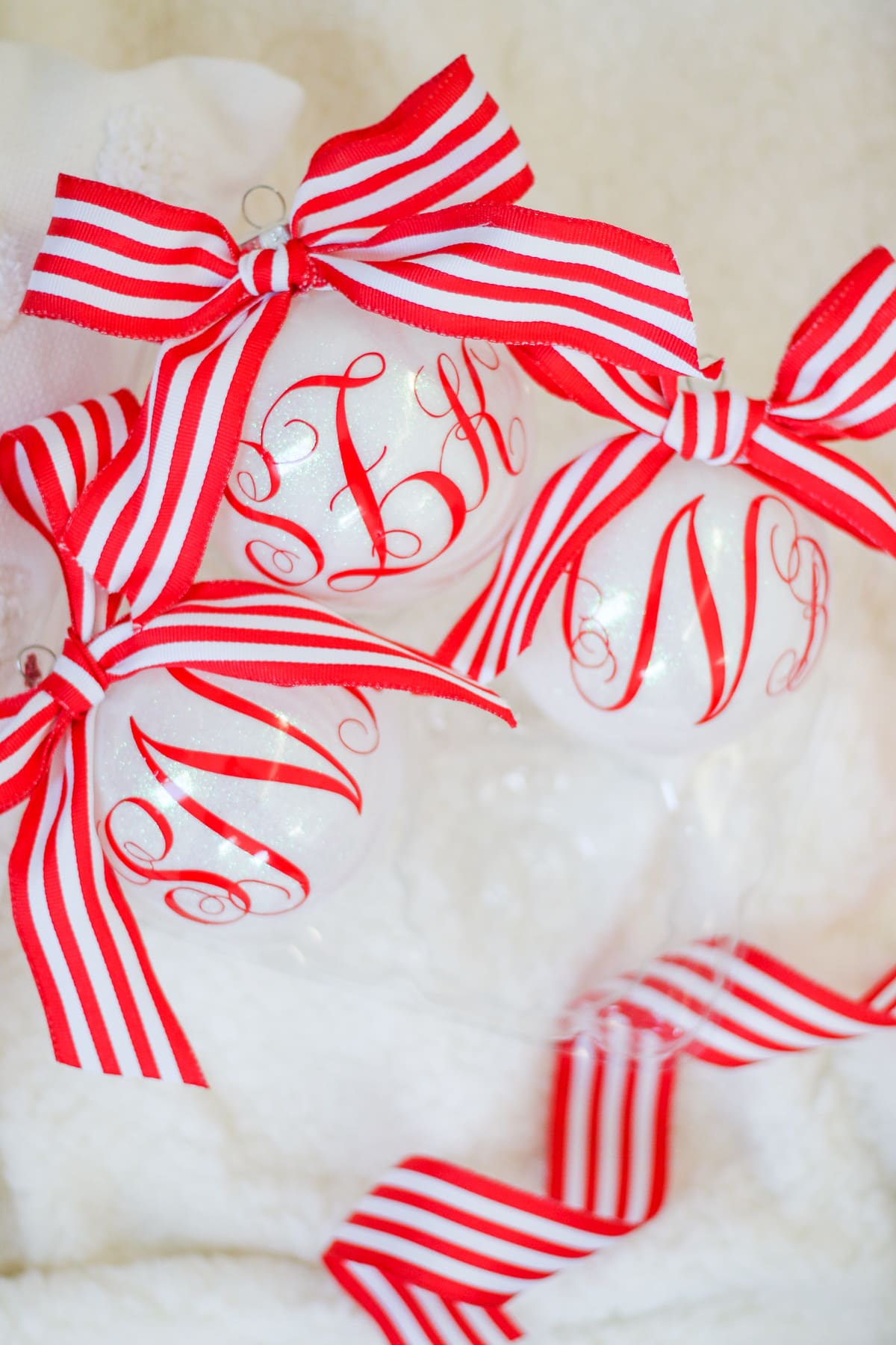 How to Make Gorgeous DIY Glitter Ornaments with Polycrylic (and Cricut Monograms) by southern lifestyle blogger Stephanie Ziajka from Diary of a Debutante, DIY monogrammed glitter ornaments, how to make monograms on the Cricut Explore Air 2, glitter glass ornaments, glitter ornaments with vinyl, making glitter Christmas ornaments, how to make vinyl monograms with Cricut