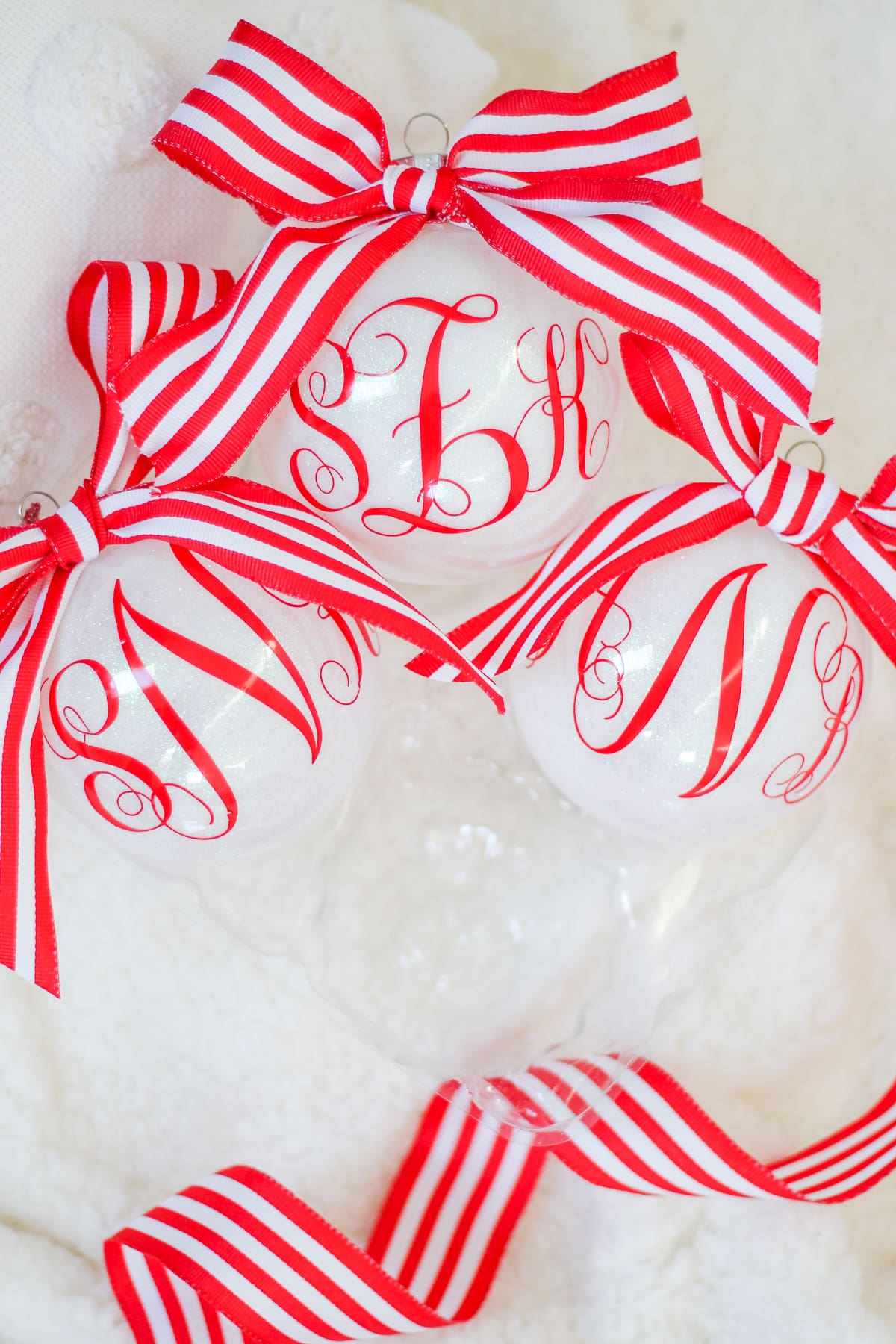 How to Make Gorgeous DIY Glitter Ornaments with Polycrylic (and Cricut Monograms) by southern lifestyle blogger Stephanie Ziajka from Diary of a Debutante, DIY monogrammed glitter ornaments, how to make monograms on the Cricut Explore Air 2, glitter glass ornaments, glitter ornaments with vinyl, making glitter Christmas ornaments, how to make vinyl monograms with Cricut