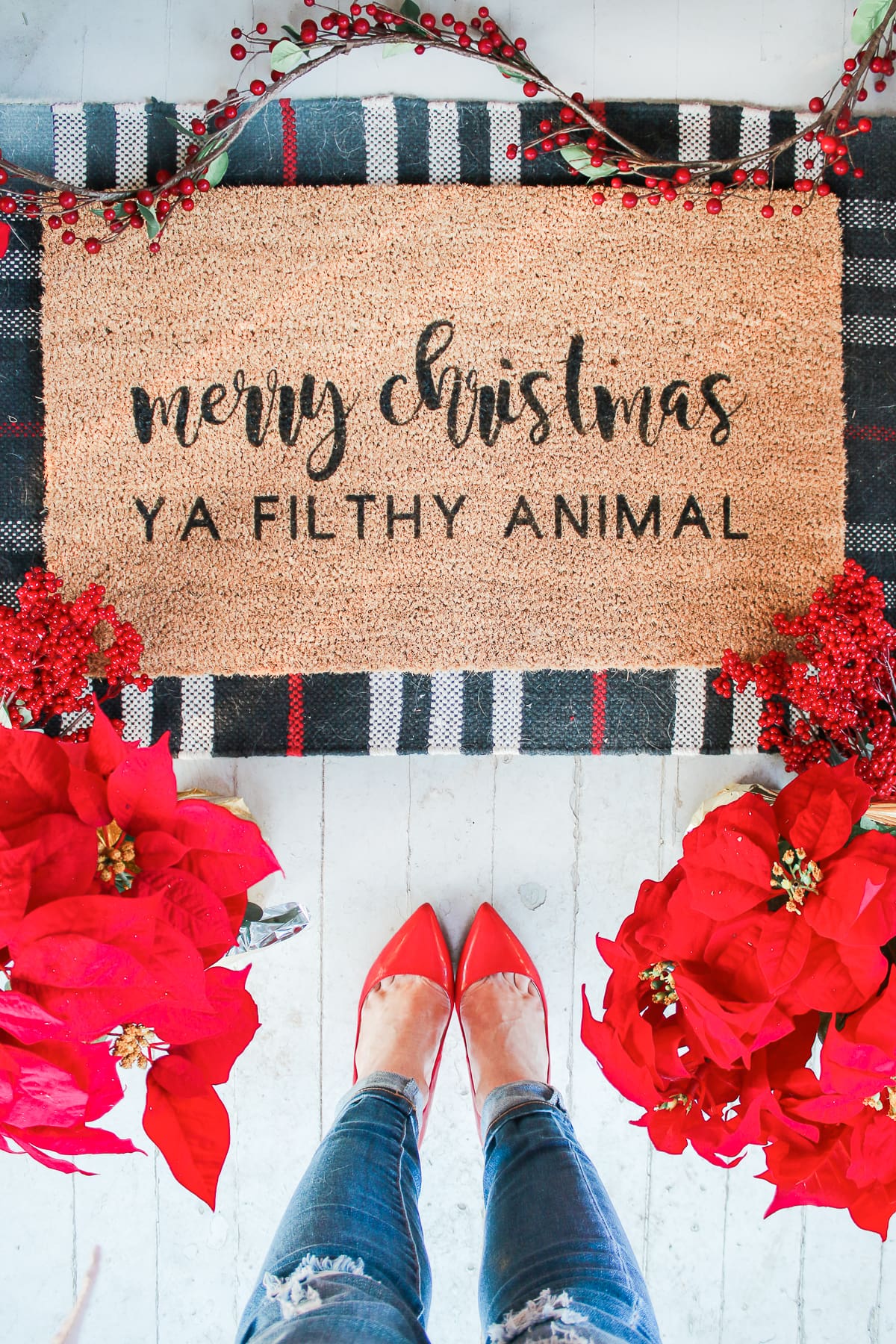 "Merry Christmas Ya Filthy Animal" DIY Painted Doormat by southern lifestyle blogger Stephanie Ziajka from Diary of a Debutante, DIY doormat stencil with Cricut Explore Air 2, Cricut doormat tutorial, DIY outdoor mat, paint your own doormat tutorial, paint doormat