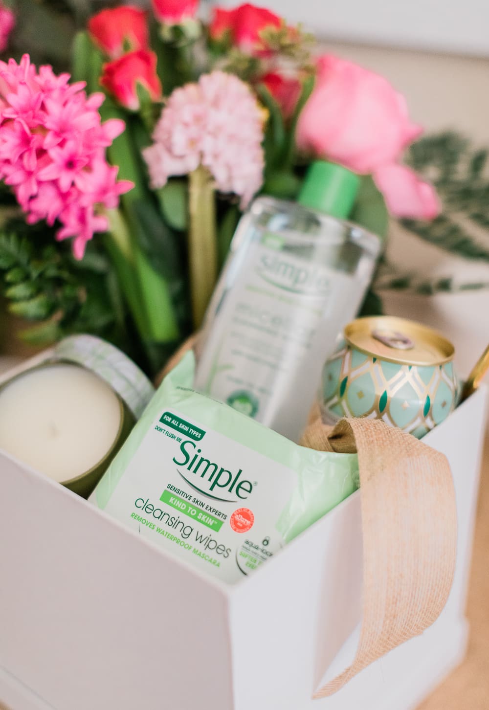 Galentine's Day Party Guide: Tips for Hosting a Fondue Party at Home written by Stephanie Ziajka from the popular southern lifestyle blog Diary of a Debutante, DIY dessert board ideas, easy Galentine's Day dessert board, dessert fondue dippers, how to throw a fondue party, Simple skincare review, Simple Micellar Cleansing Water review, Simple Cleansing Facial Wipes review, Galentine's Day gift box ideas