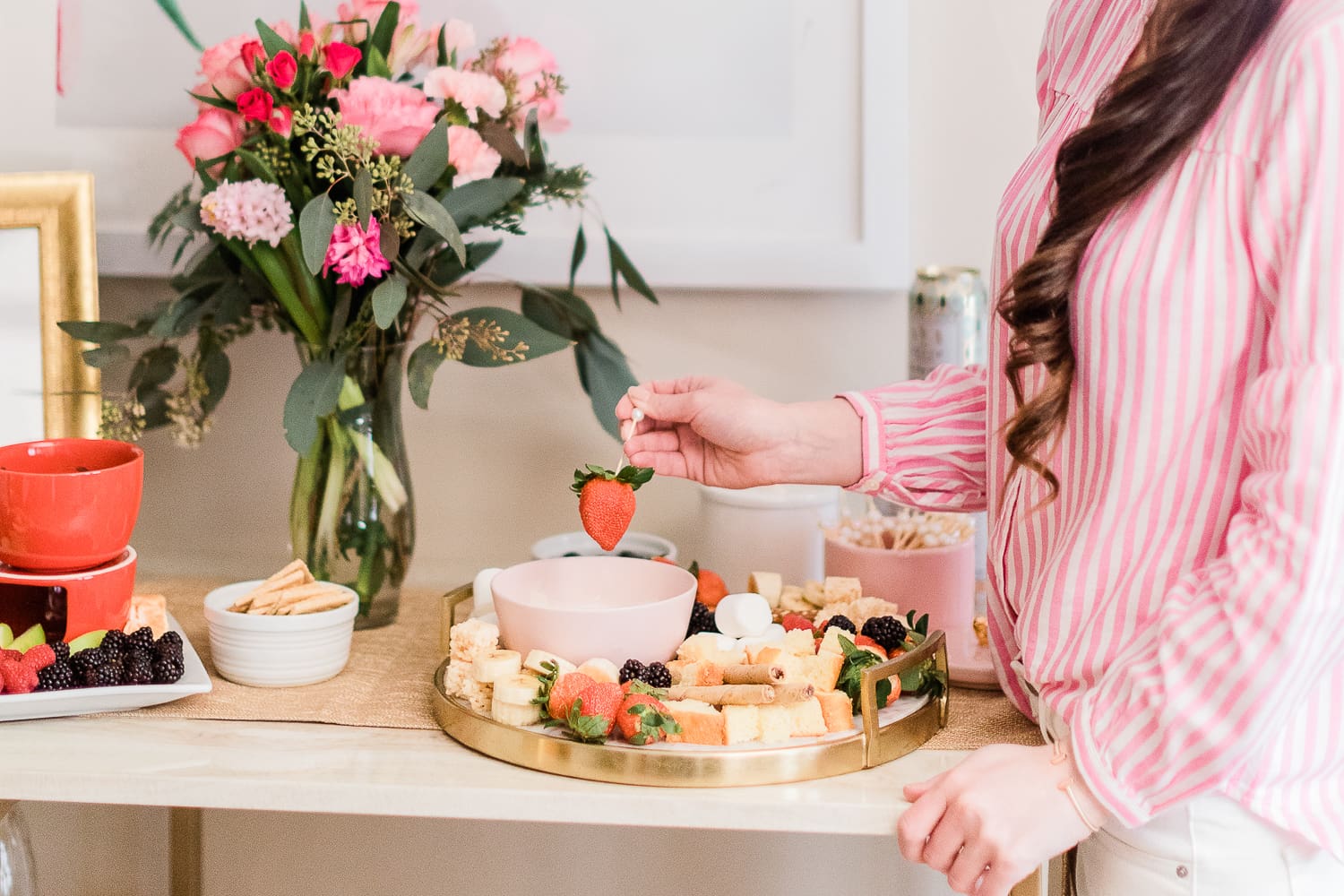 tips for hosting a fondue party, how to make a chocolate fondue bar, chocolate fondue bar tips, DIY dessert board ideas, easy Galentine's Day dessert board, dessert fondue dippers, how to throw a fondue party, Simple skincare review, Simple Micellar Cleansing Water review, Simple Cleansing Facial Wipes review, Galentine's Day gift box ideas