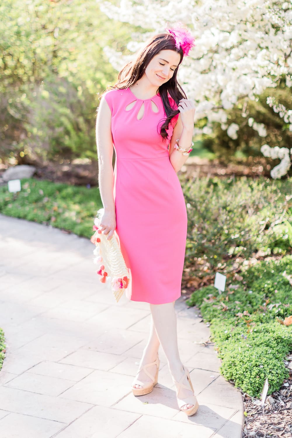 Maggy London Alyssa Midi Dress styled with a pink fascinator headband, straw pom pom and tassel clutch, and nude Steve Madden wedges, Derby Day Style Guide: 3 Head-to-Toe Kentucky Derby Outfit Ideas by affordable fashion blogger Stephanie Ziajka from Diary of a Debutante
