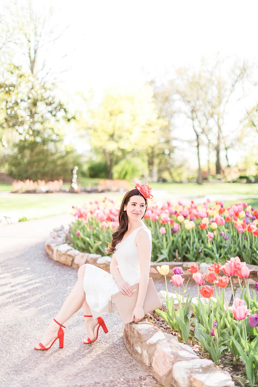 Maggie London Noreen Midi Dress styled with red fascinator headband, GiGi New York Uber Clutch, and red block heel sandals, Derby Day Style Guide: 3 Head-to-Toe Kentucky Derby Outfit Ideas by affordable fashion blogger Stephanie Ziajka from Diary of a Debutante
