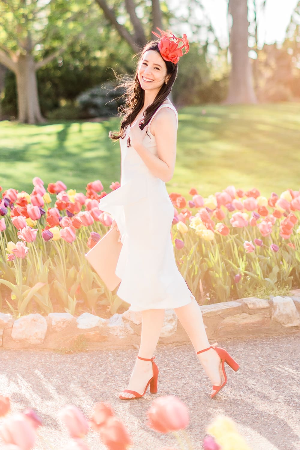Maggie London Noreen Midi Dress styled with red fascinator headband, GiGi New York Uber Clutch, and red block heel sandals, Derby Day Style Guide: 3 Head-to-Toe Kentucky Derby Outfit Ideas by affordable fashion blogger Stephanie Ziajka from Diary of a Debutante