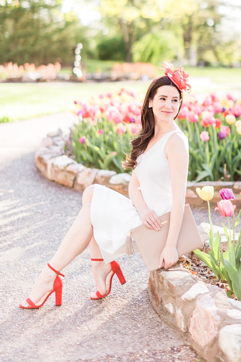 Maggie London Noreen Midi Dress styled with red fascinator headband, GiGi New York Uber Clutch, and red block heel sandals, Derby Day Style Guide: 3 Head-to-Toe Kentucky Derby Outfit Ideas by affordable fashion blogger Stephanie Ziajka from Diary of a Debutante