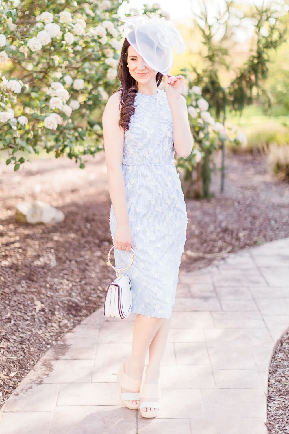 Maggy London Cecilia Midi Dress styled with a white fascinator headband, white Chloe Nile dupe bag, and espadrille slide sandals, Derby Day Style Guide: 3 Head-to-Toe Kentucky Derby Outfit Ideas by affordable fashion blogger Stephanie Ziajka from Diary of a Debutante