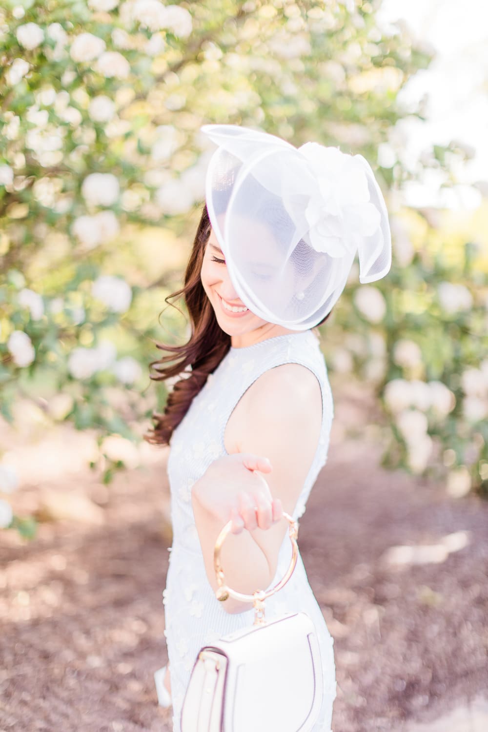 Maggy London Cecilia Midi Dress styled with a white fascinator headband, white Chloe Nile dupe bag, and espadrille slide sandals, Derby Day Style Guide: 3 Head-to-Toe Kentucky Derby Outfit Ideas by affordable fashion blogger Stephanie Ziajka from Diary of a Debutante