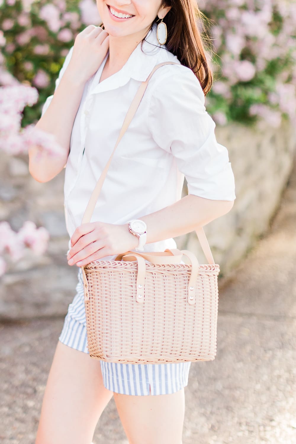 Old Navy Twill Everday Shorts: Long Sleeve Dress Shirt with Shorts Outfit by Stephanie Ziajka from the popular affordable fashion blog Diary of a Debutante, how to wear striped shorts, striped Old Navy Twill Everyday Shorts, how to wear twill shorts, J.Crew Factory White Oxford Shirt, Target Basket Crossbody Bag, White Kendra Scott Danielle Earrings, White Michele Watch, White Jack Rogers Sandals