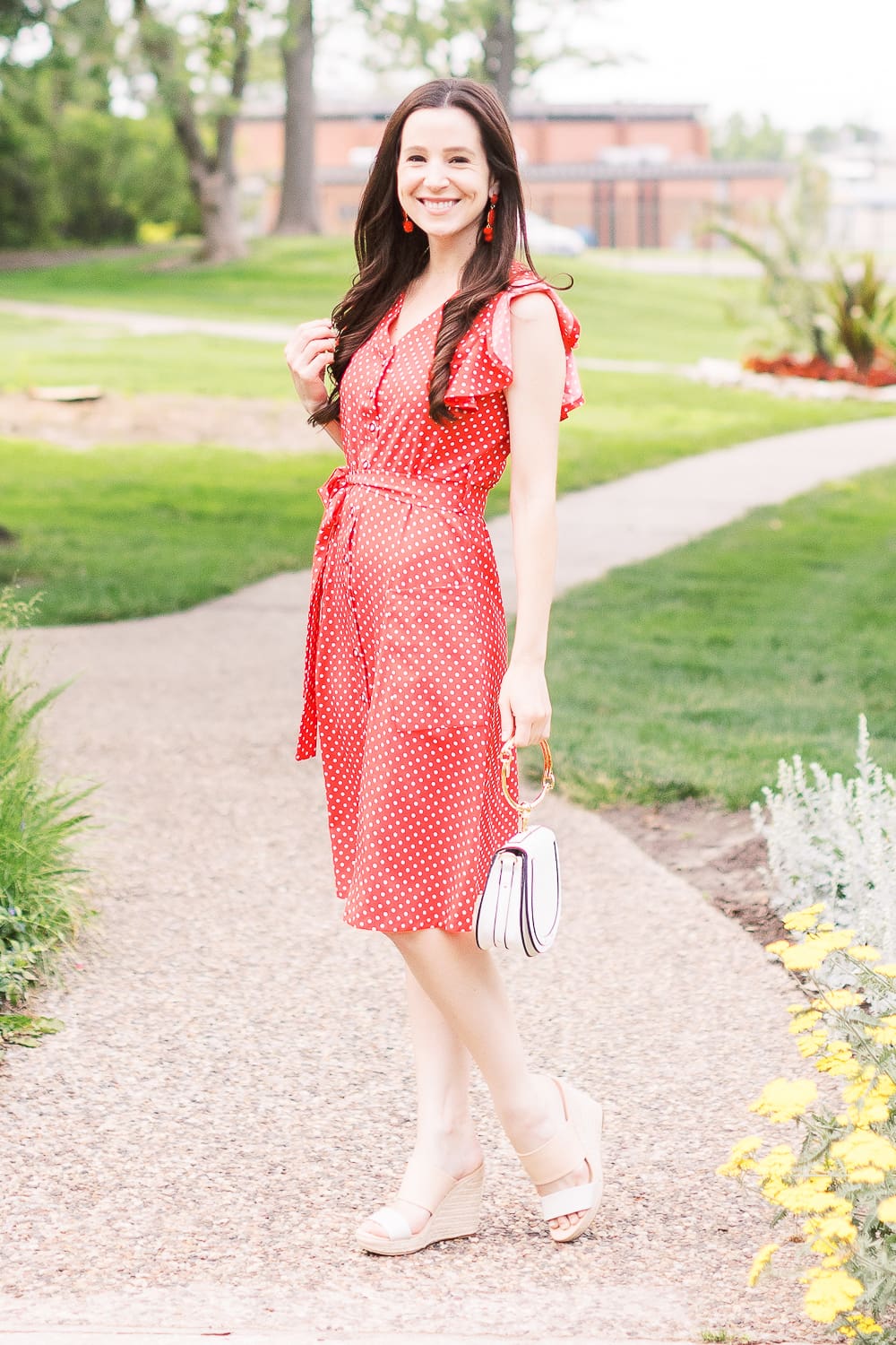 4th of July Outfit Idea: Red Polka Dot Midi Dress Outfit by popular affordable style blogger Stephanie Ziajka on Diary of a Debutante, MITILLY Polka Dot Sleeveless V Neck Swing Midi Dress with Pockets, white Chloe Nile dupe bag, A New Day Women's Adelina Espadrilles Slide Sandals