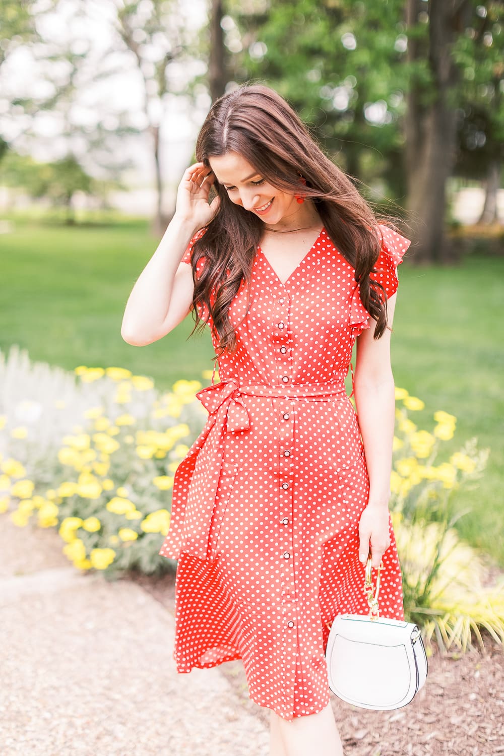 4th of July Outfit Idea: Red Polka Dot Midi Dress Outfit by popular affordable style blogger Stephanie Ziajka on Diary of a Debutante, MITILLY Polka Dot Sleeveless V Neck Swing Midi Dress with Pockets, white Chloe Nile dupe bag, A New Day Women's Adelina Espadrilles Slide Sandals