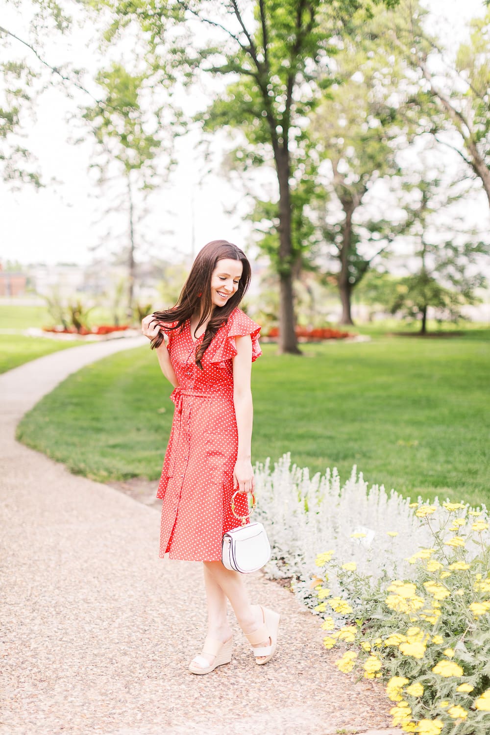 4th of July Outfit Idea: Red Polka Dot Midi Dress Outfit by popular affordable style blogger Stephanie Ziajka on Diary of a Debutante, MITILLY Polka Dot Sleeveless V Neck Swing Midi Dress with Pockets, white Chloe Nile dupe bag, A New Day Women's Adelina Espadrilles Slide Sandals