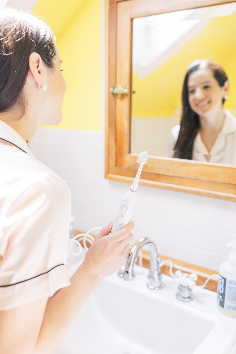 Waterpik Sonic Fusion Flossing Toothbrush, Sonic-Fushion Flossing Toothbrush Review by popular southern lifestyle blogger Stephanie Ziajka from Diary of a Debutante, morning self-care routine, drinking coffee on the couch, pink silk pajama set