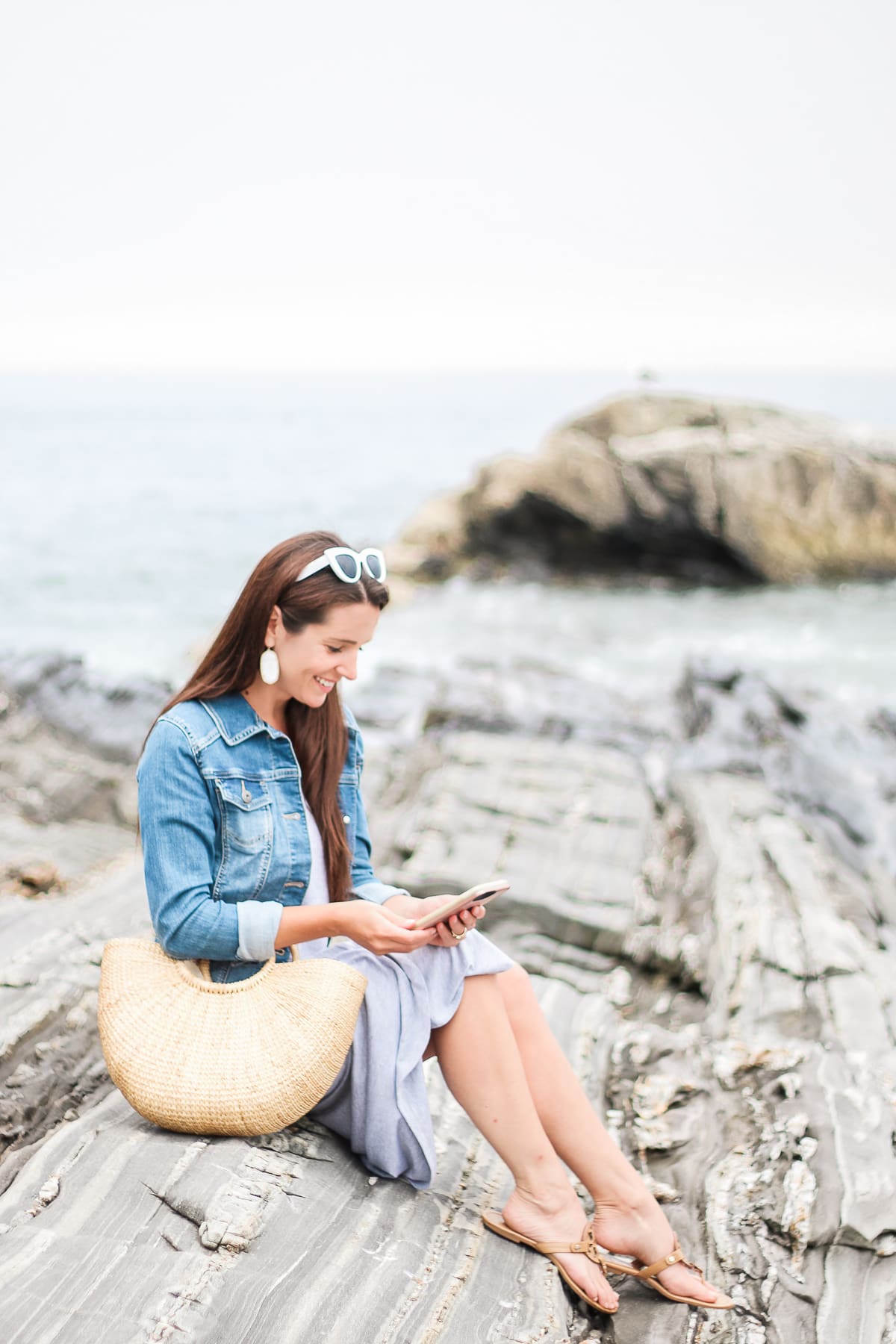 5 Reasons to Upgrade to 5G + Verizon's Best 5G Smartphones by popular midwest lifestyle blogger Stephanie Ziajka from Diary of a Debutante, top Verizon 5G enabled smartphones, Pemaquid Point Maine, Maine coastline, gray short sleeve maxi dress with denim jacket outfit, cute Maine vacation outfit