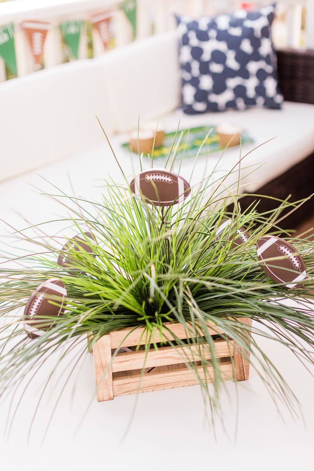 DIY Game Day centerpiece by popular DIY blogger Stephanie Ziajka on Diary of a Debutante, DIY football centerpiece ideas, DIY game day centerpiece ideas, faux grass centerpiece