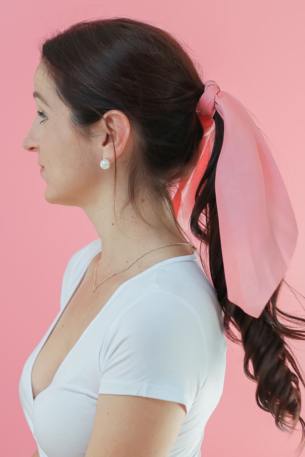How to Wear Hair Scarves: 3 Easy-to-Wear Hairstyles + Fall Hair Refresh by popular beauty blogger Stephanie Ziajka on Diary of a Debutante, ways to wear hair scarves, how to wear a scarf in your hair, pink hair scarf, messy low ponytail hair scarf hairstyle