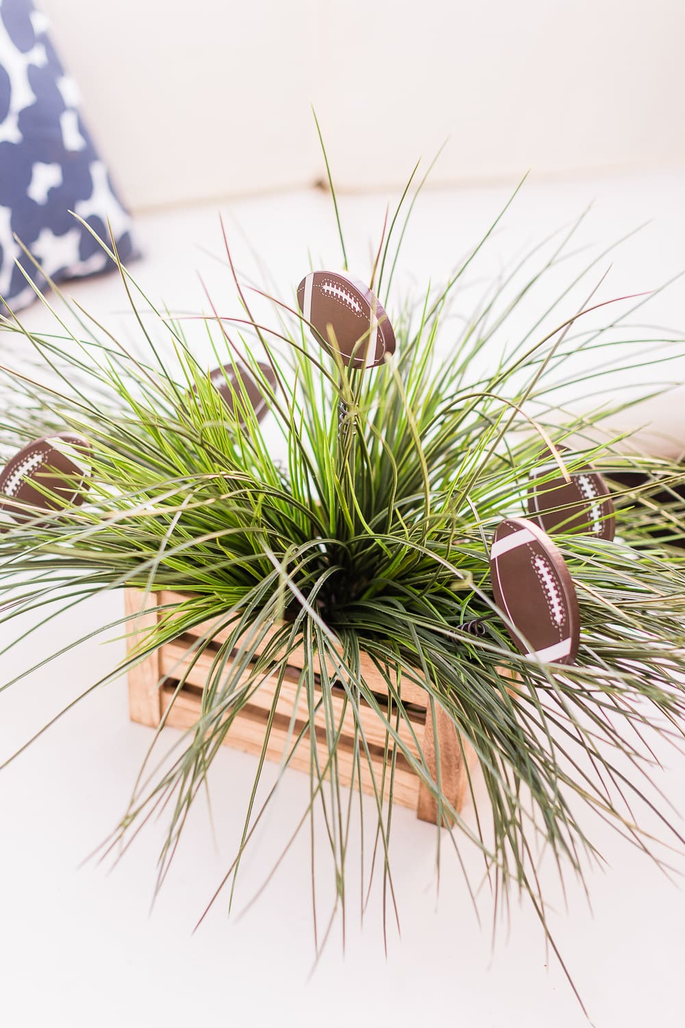DIY Game Day centerpiece by popular DIY blogger Stephanie Ziajka on Diary of a Debutante, DIY football centerpiece ideas, DIY game day centerpiece ideas, faux grass centerpiece