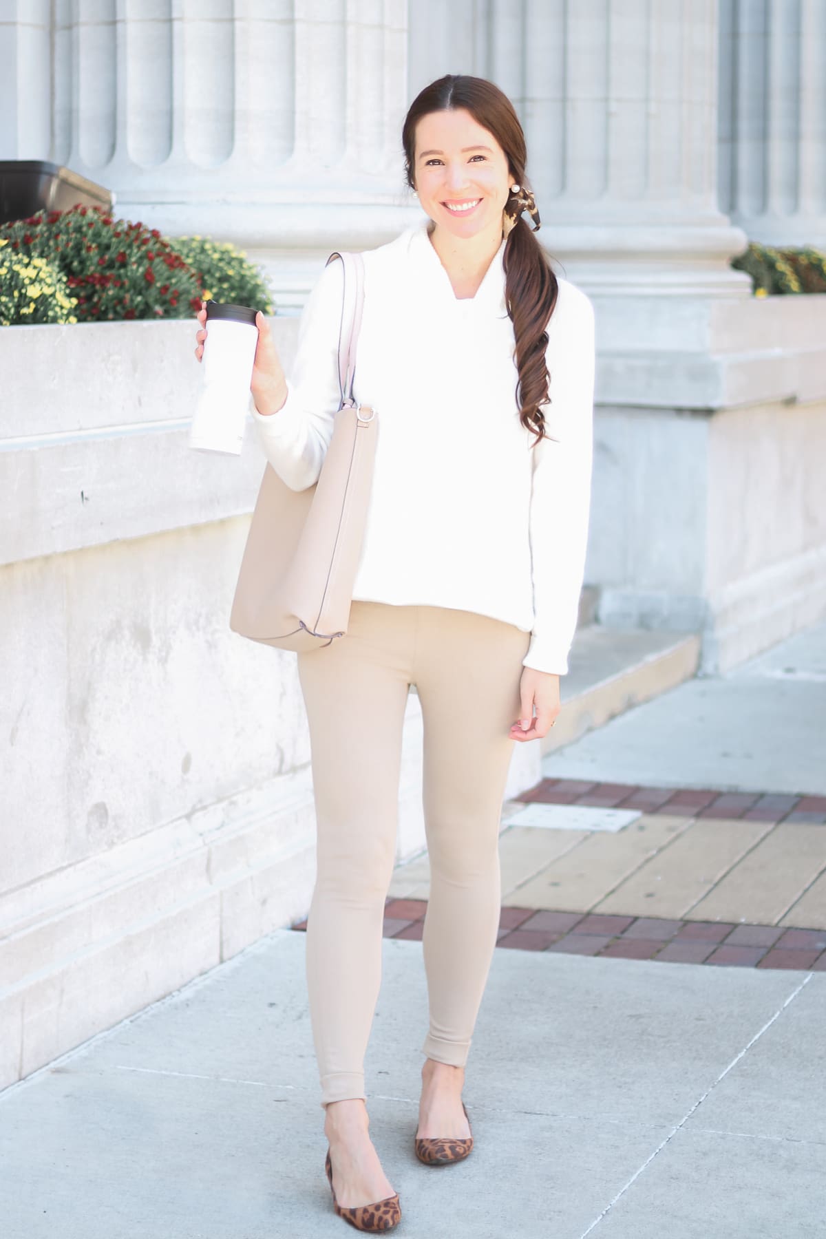 Shopping Haul: Best Walmart Fall Fashion Finds by affordable fashion blogger Stephanie Ziajka on Diary of a Debutante, Time and Tru white cowl neck tunic sweater, Time and Tru brownstone jeggings, Time and Tru leopard bow scrunchie, Time and Tru reversible Leigh tote, Time and Tru leopard flats