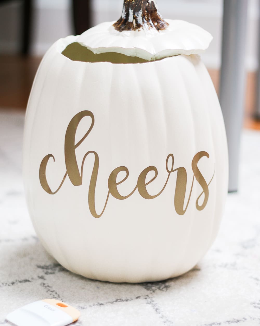 The final step of DIY blogger Stephanie Ziajka's easy Cricut Explore Air 2 fall vinyl project on Diary of a Debutante