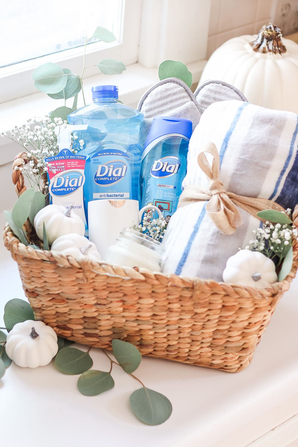 Practical Gift Basket Idea for Teachers, New Moms, and Volunteers by popular affordable entertaining blogger Stephanie Ziajka on Diary of a Debutante, eucalyptus in a gift basket, decorating gift basket with eucalyptus