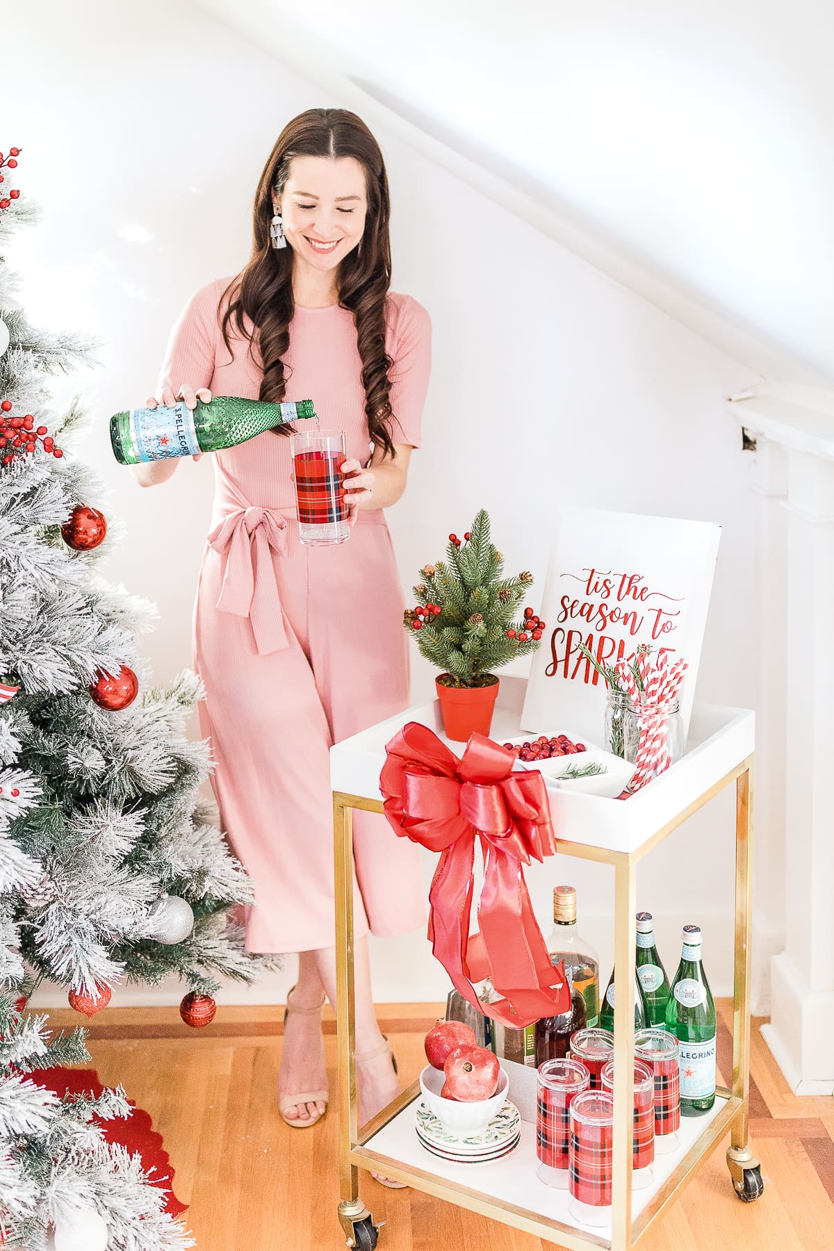 Christmas bar cart, Christmas bar cart styling ideas, holiday bar cart, holiday bar cart styling ideas, special edition Pellegrino bottle, popular lifestyle blogger Stephanie Ziajka, popular lifestyle blog Diary of a Debutante, rose pink jumpsuit, Amazon pink jumpsuit