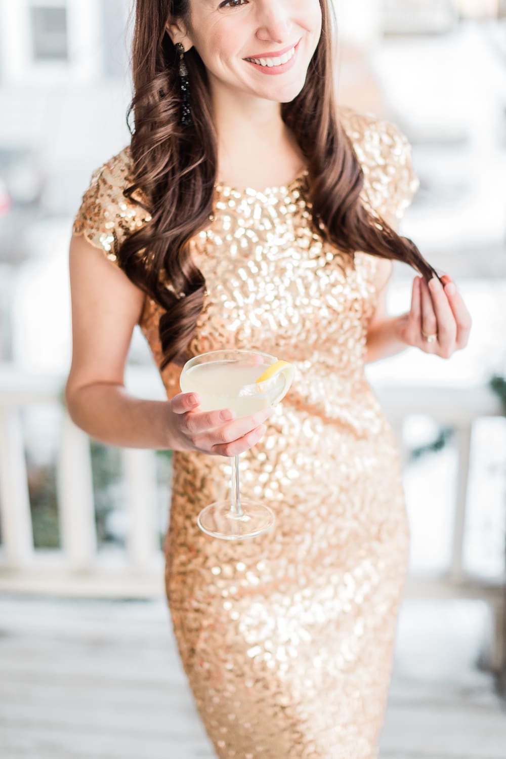 french 75 with st germain, classic champagne coupe glass, kate spade inspired holiday outfit, amazon sequin mini dress, amazon gold sequin mini dress, amazon gold nye dress, affordable fashion blogger stephanie ziajka, affordable fashion blog diary of a debutante