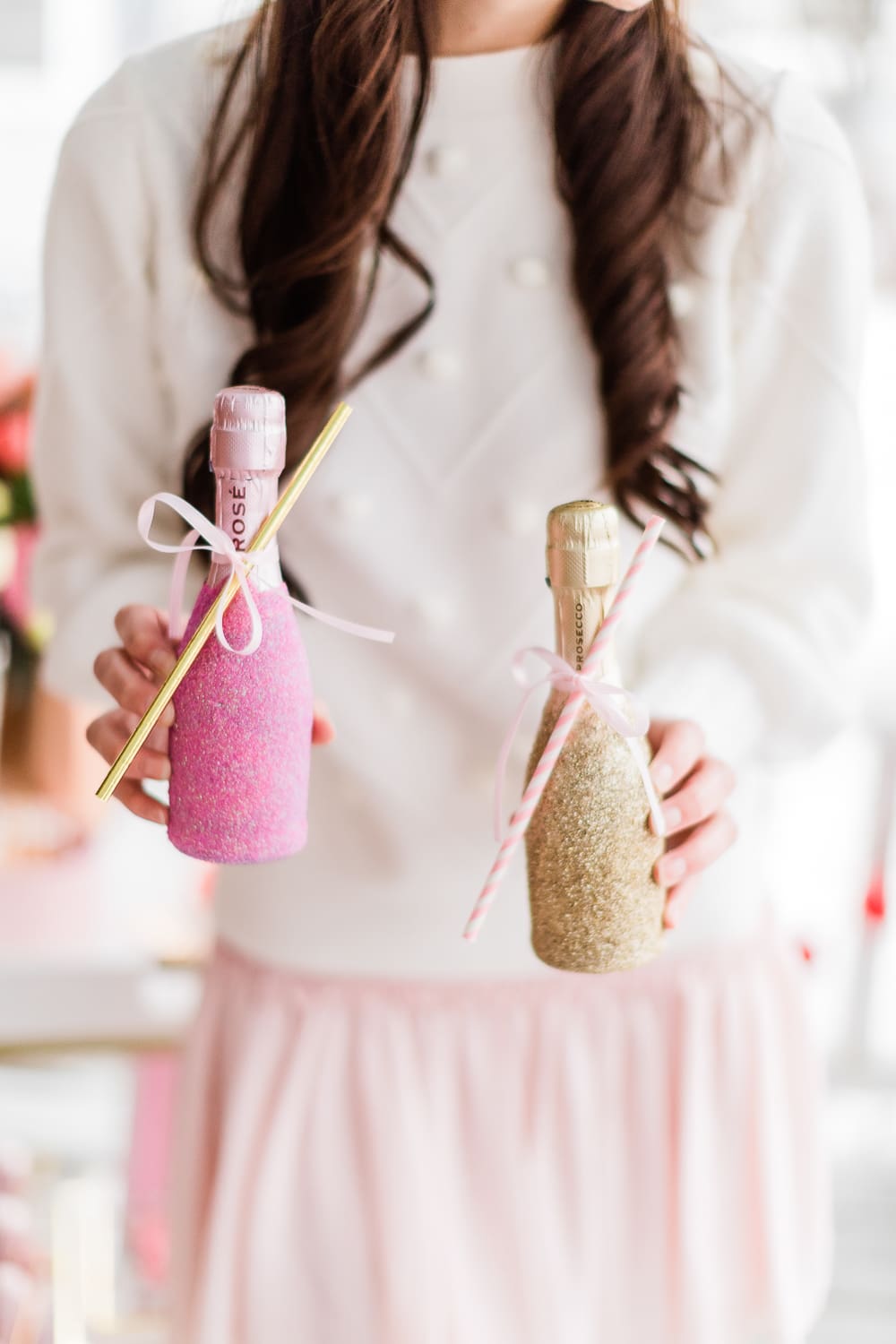 Gold and pink glitter prosecco bottles made by southern lifestyle blogger Stephanie Ziajka on Diary of a Debutante