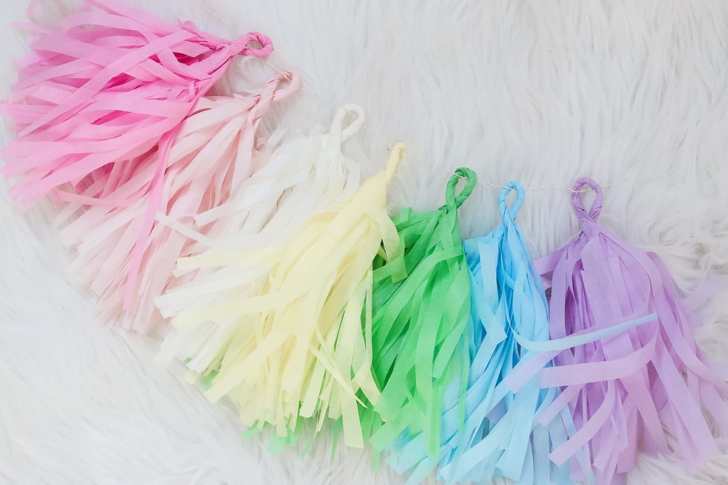 DIY blogger Stephanie Ziajka shows how to make tissue garland on Diary of a Debutante