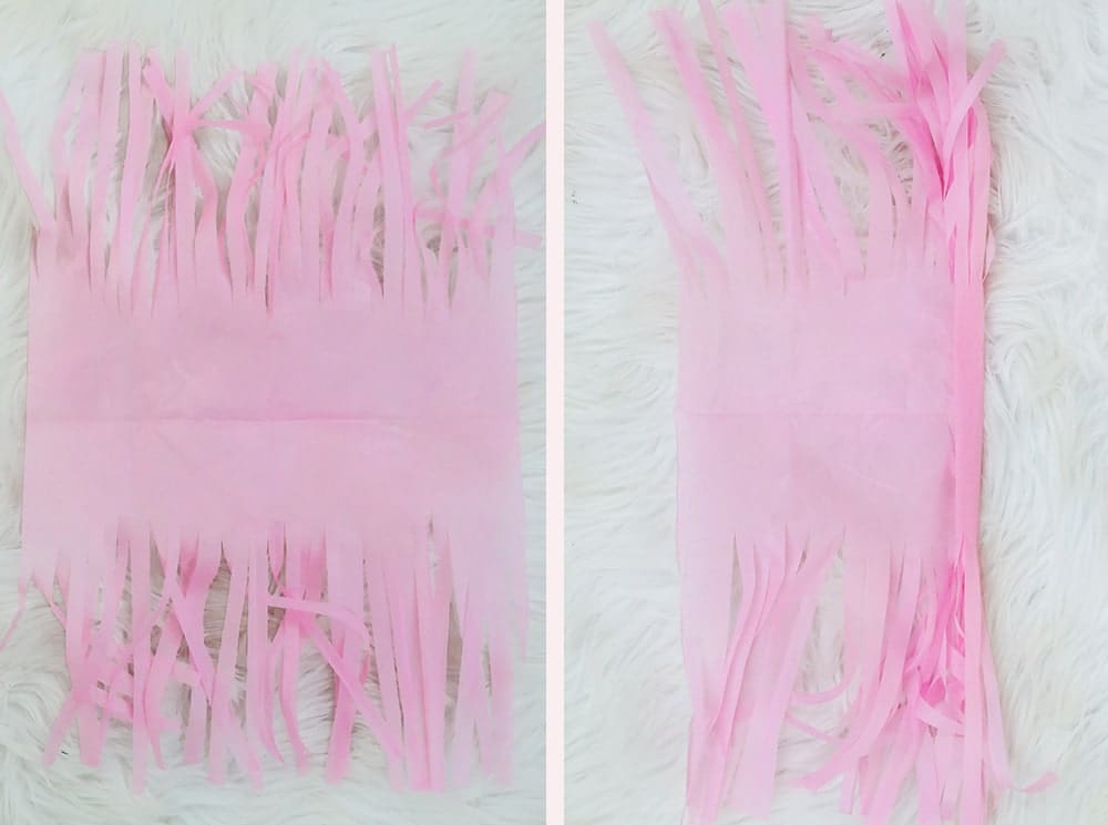 Step 4 of how to make tassels out of tissue paper by DIY blogger Stephanie Ziajka on Diary of a Debutante