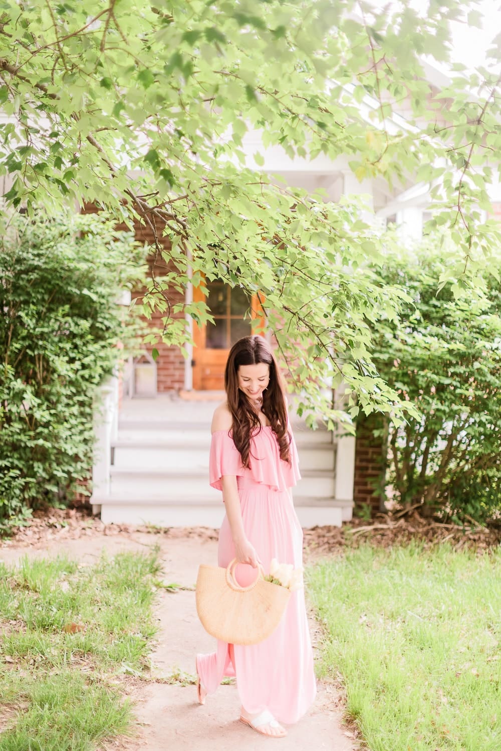Affordable fashion blogger Stephanie Ziajka shares her favorite off the shoulder flowy maxi dress under 50 on Diary of a Debutante