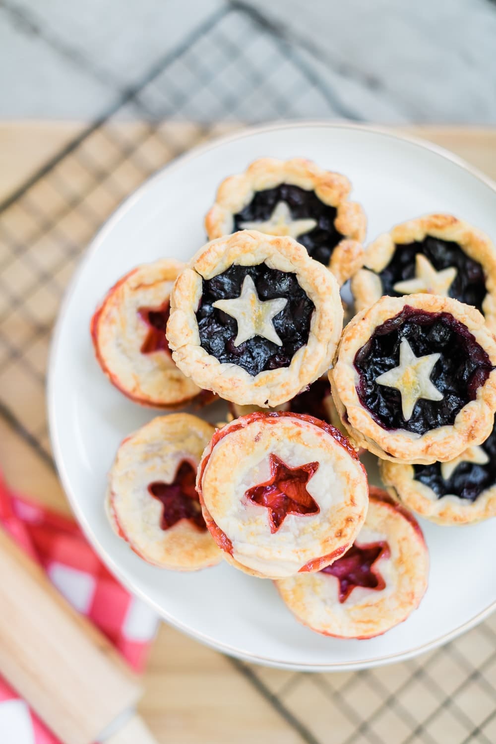 Patriotic mini strawberry and blueberry pies by blogger Stephanie Ziajka on Diary of a Debutante