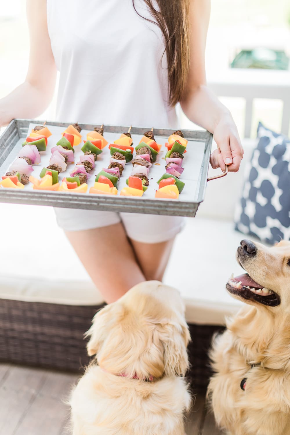 Two cute golden retriever puppies begging for food on Diary of a Debutante
