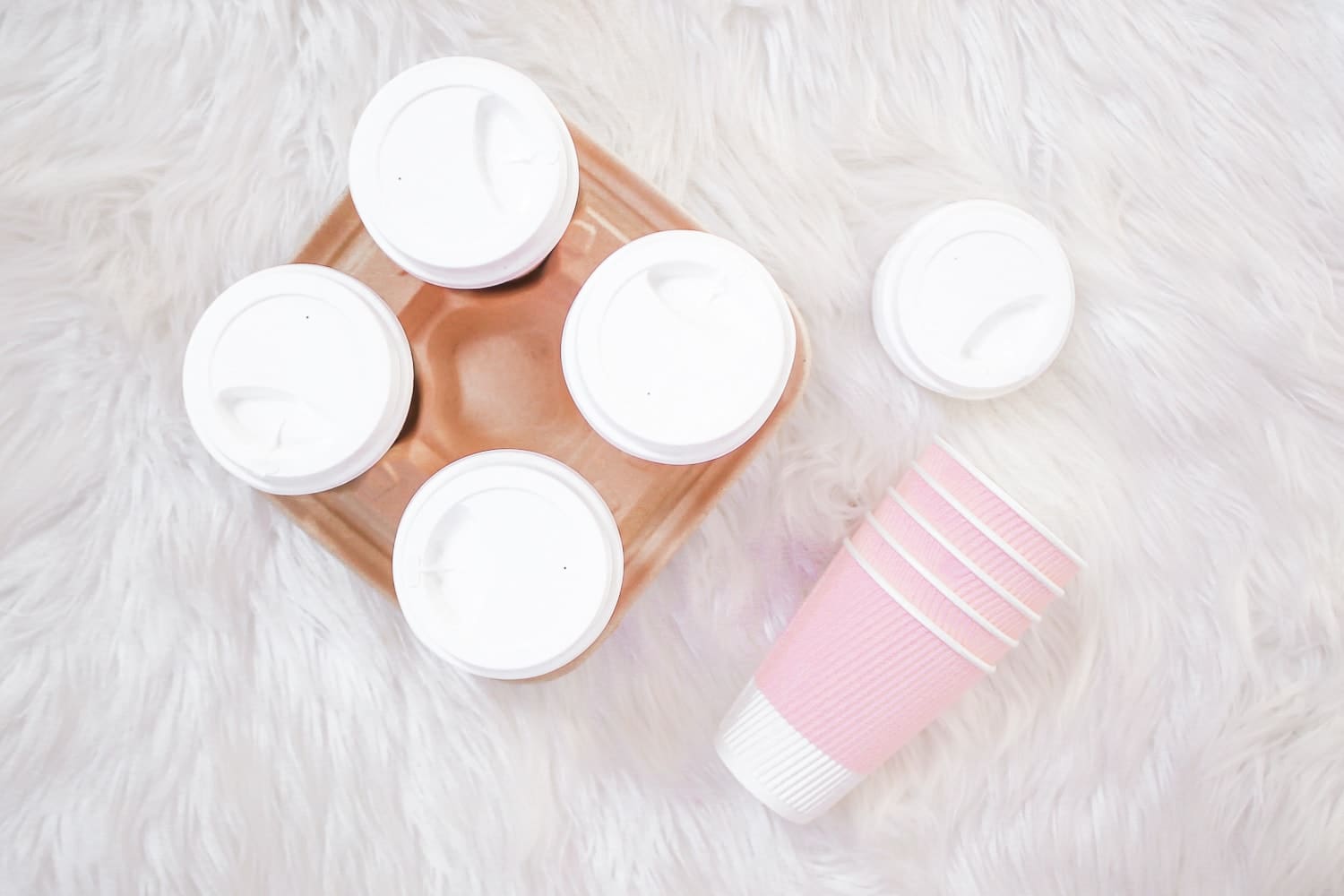 Pink disposable coffee cups on Diary of a Debutante