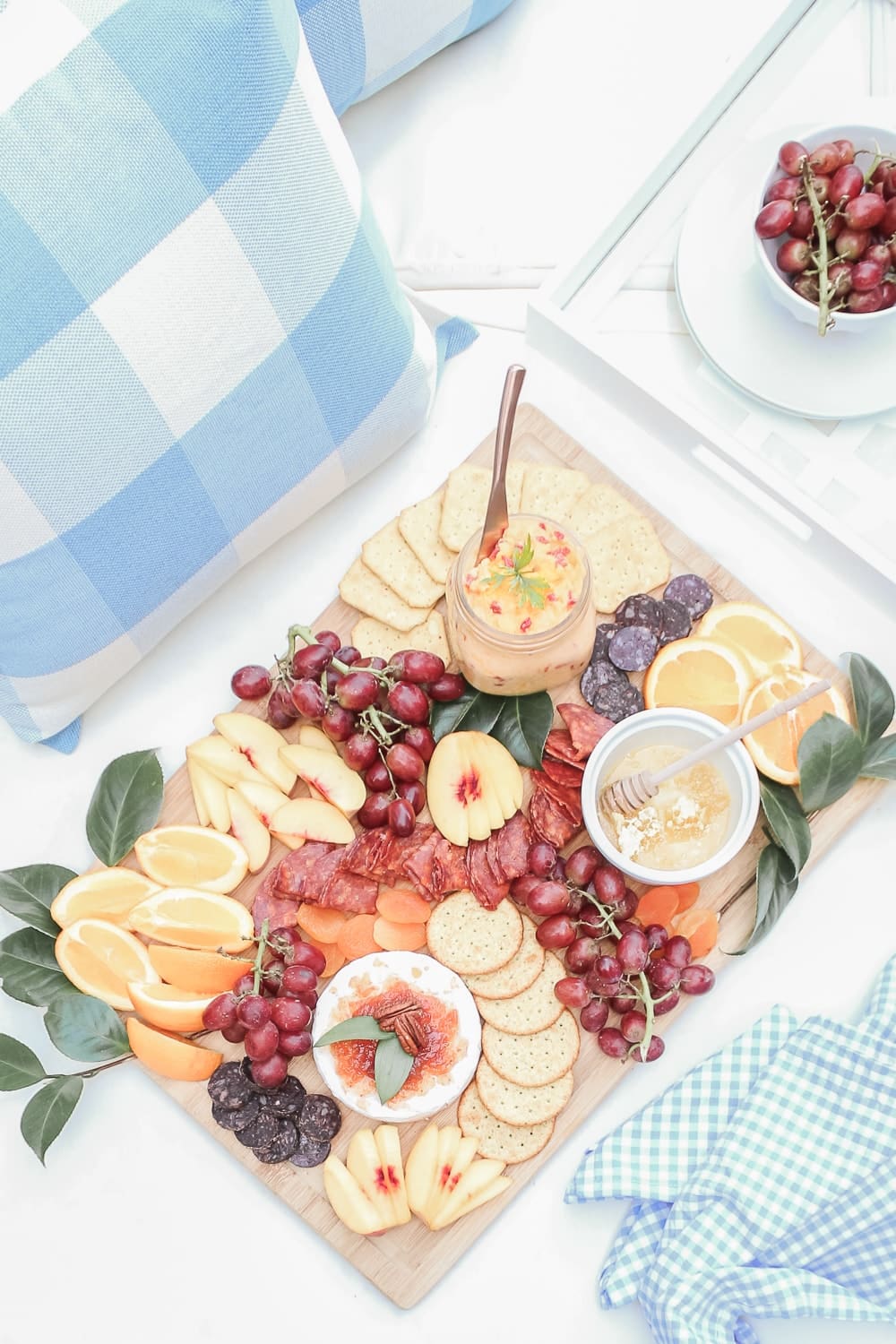 Southern-inspired charcuterie and cheese board designed by southern lifestyle blogger Stephanie Ziajka on Diary of a Debutante