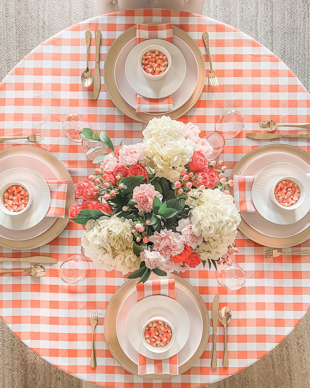 Orange and pink Halloween tablescape designed by southern lifestyle blogger Stephanie Ziajka on Diary of a Debutante