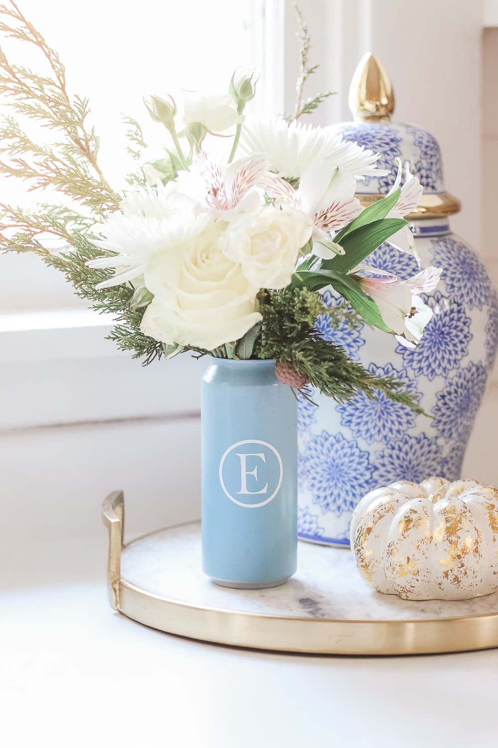 Chic upcycled DIY soda can vase tutorial by DIY blogger Stephanie Ziajka on Diary of a Debutante