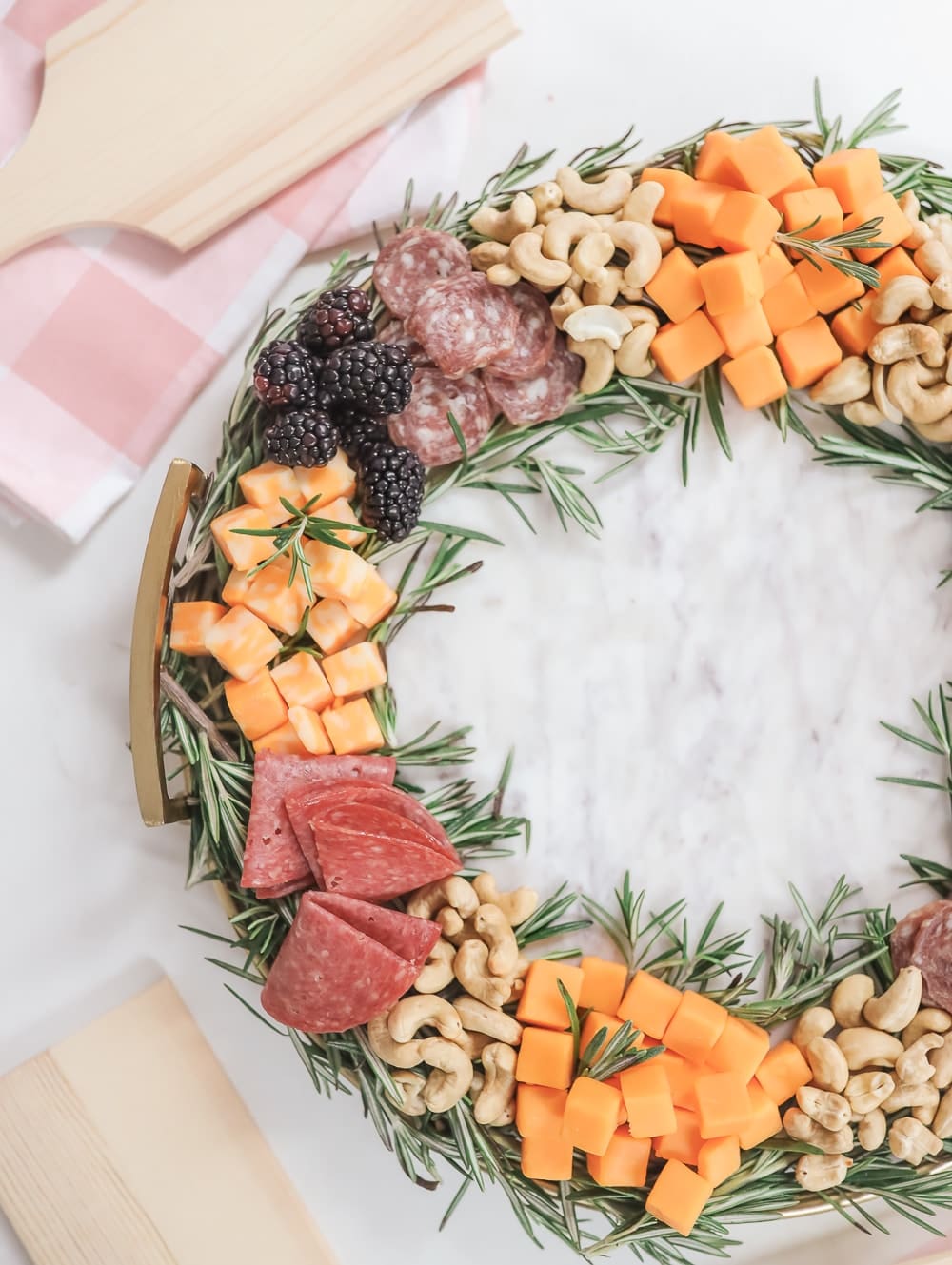 Blogger Stephanie Ziajka shares some simple Christmas charcuterie board ideas on Diary of a Debutante
