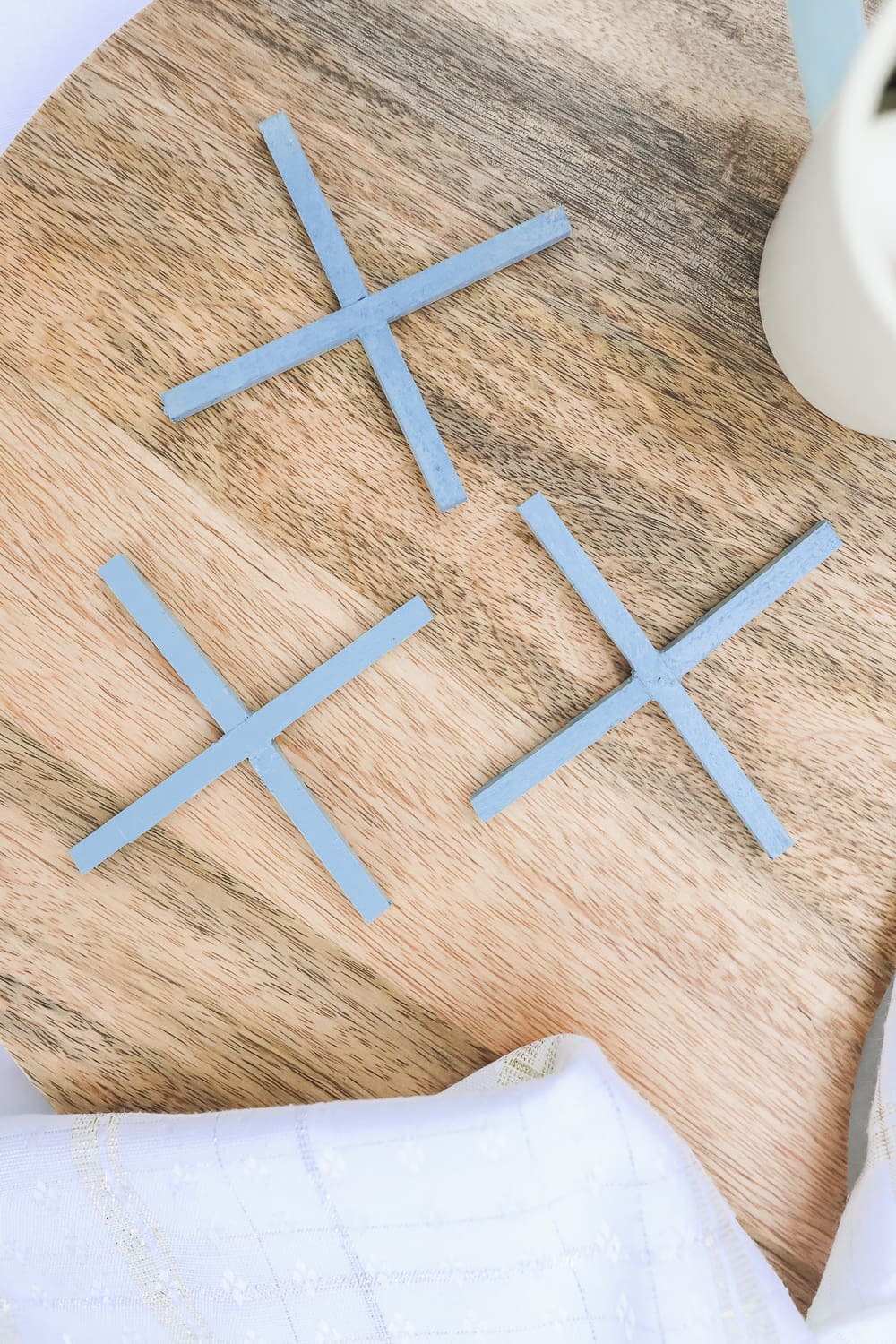 DIY wooden coaster set created by blogger Stephanie Ziajka using the MakerX rotary tool and MakerX angle grinder attachment on Diary of a Debutante