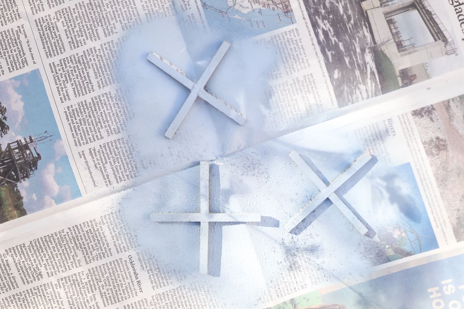 Step four of blogger Stephanie Ziajka's wooden coaster DIY tutorial using Rustoleum French Blue 2x spray paint