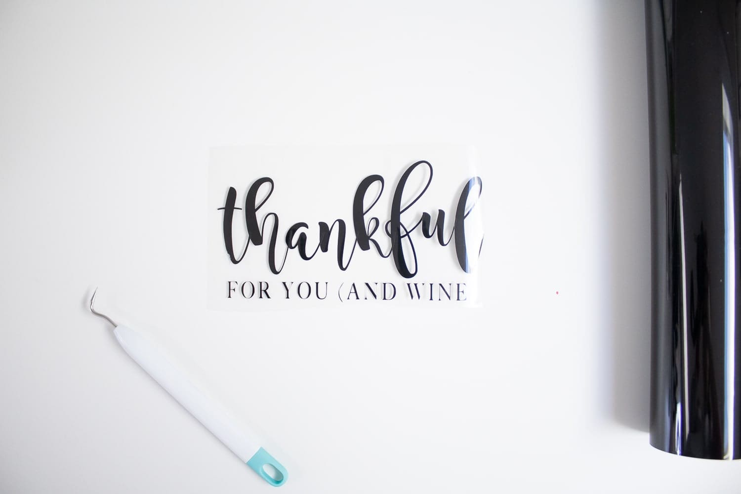 Step two of DIY blogger's Stephanie Ziajka's simplest iron on vinyl projects for fall on Diary of a Debutante