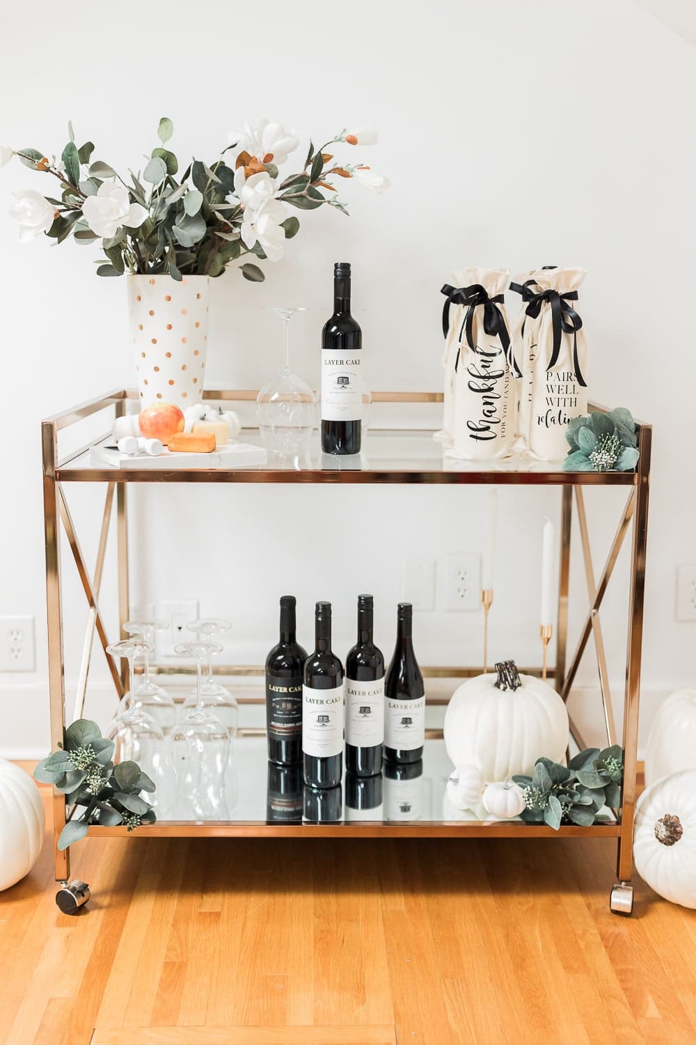 Personalized wine gift bags styled on a fall bar cart by DIY blogger Stephanie Ziajka on Diary of a Debutante