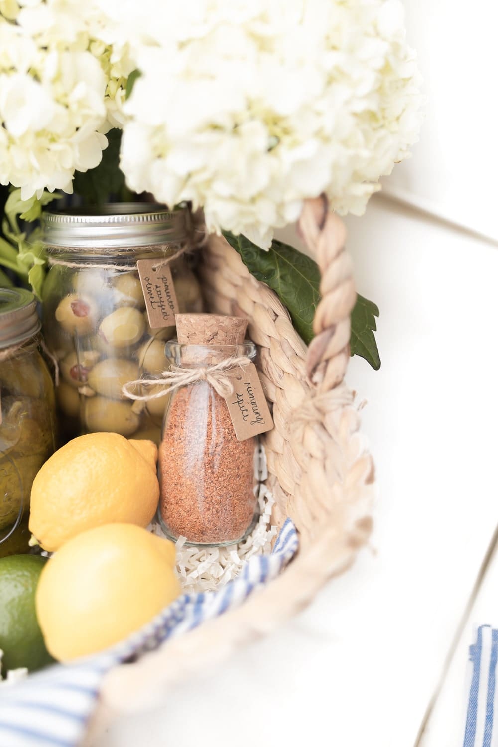 Southern lifestyle blogger Stephanie Ziajka shares a handful of Bloody mary basket ideas, along with other cocktail gift basket ideas, on Diary of a Debutante