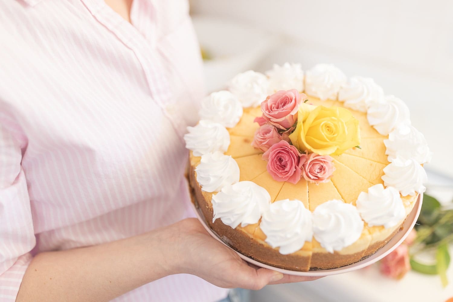 The Cheesecake Factory cheesecake decorated with flowers from Hy-Vee by blogger Stephanie Ziajka on Diary of a Debutante