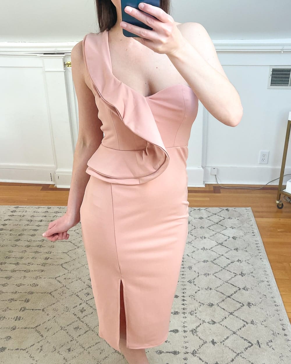 Affordable fashion blogger Stephanie Ziajka shares why this pink ruffle dress is one of her favorite Amazon spring fashion finds under 50 on Diary of a Debutante