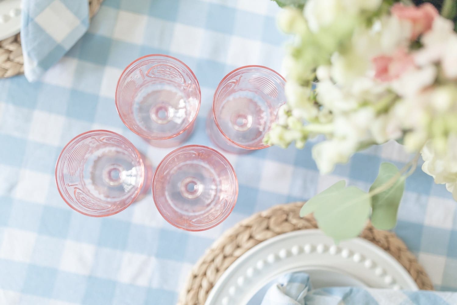 Pink Bormioli Rocco glasses styled in a spring tablescape by blogger Stephanie Ziajka on Diary of a Debutante