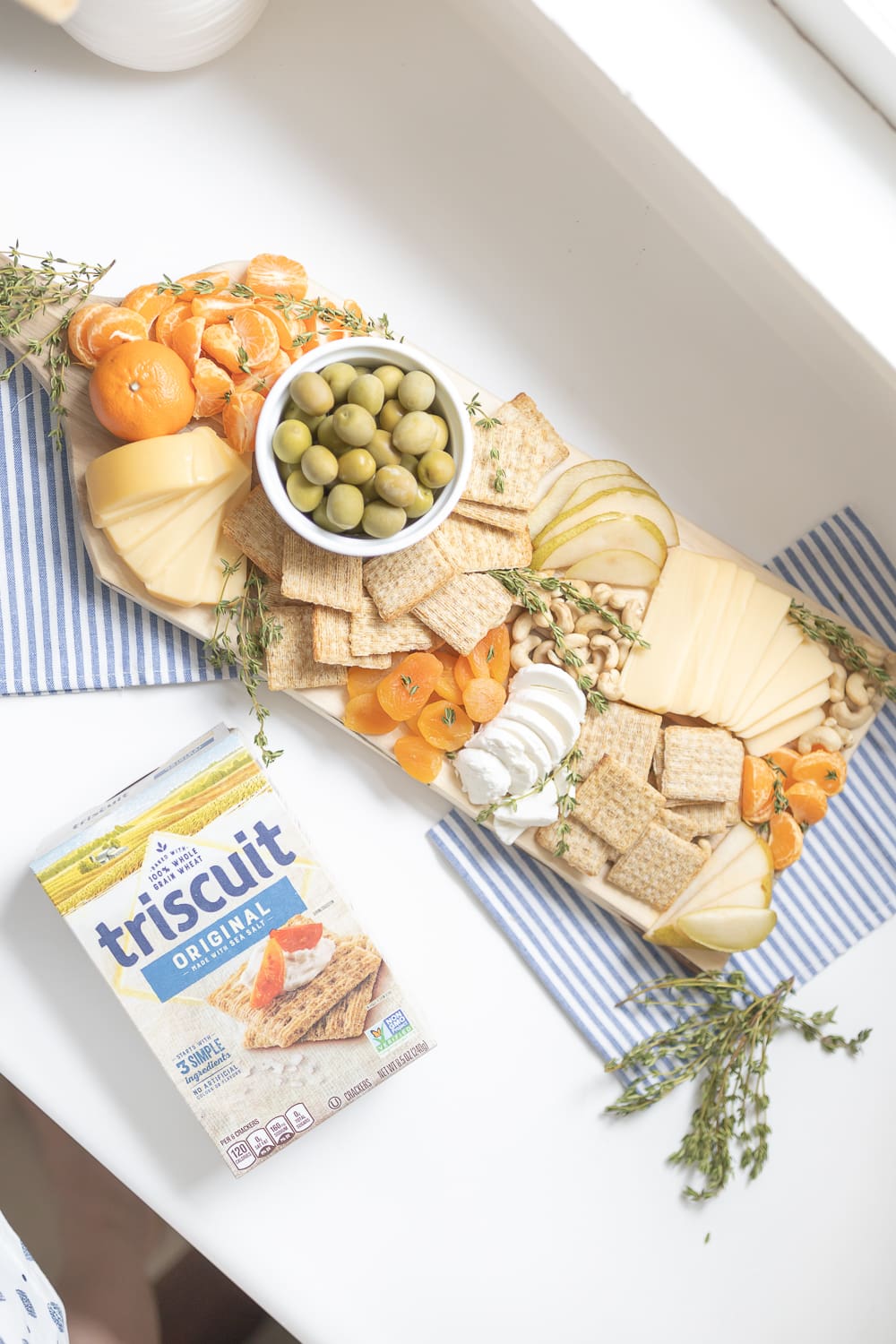 Pretty DIY cheese board made with pantry items by blogger Stephanie Ziajka on Diary of a Debutante