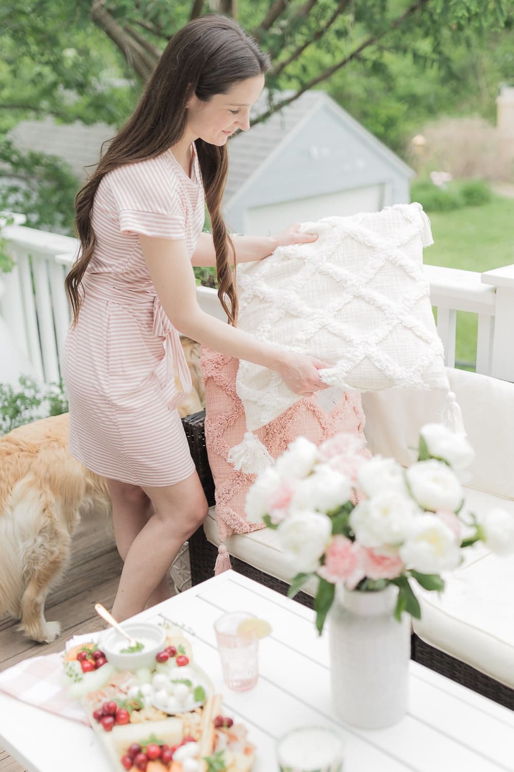 Blogger Stephanie Ziajka shares why these Walmart tufted trellis pillows are one of her top summer entertaining essentials from Walmart on Diary of a Debutante