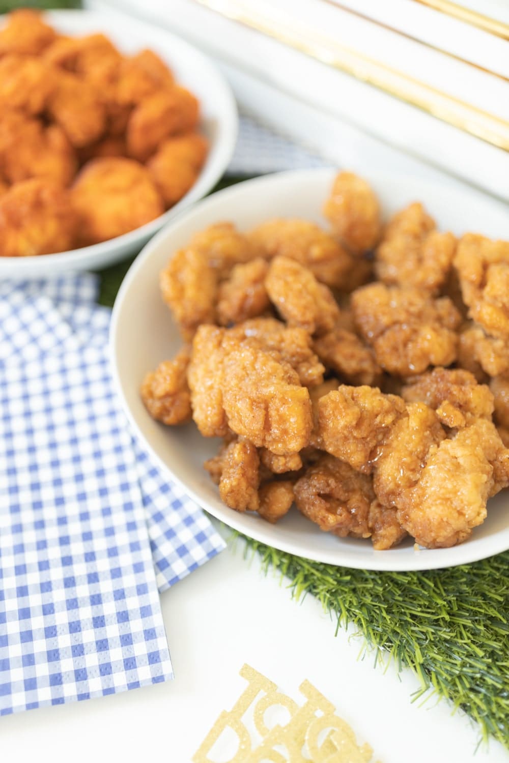 Hy-Vee honey roasted garlic buffalo chicken wings as part of a game day food spread created by blogger Stephanie Ziajka on Diary of a Debutante