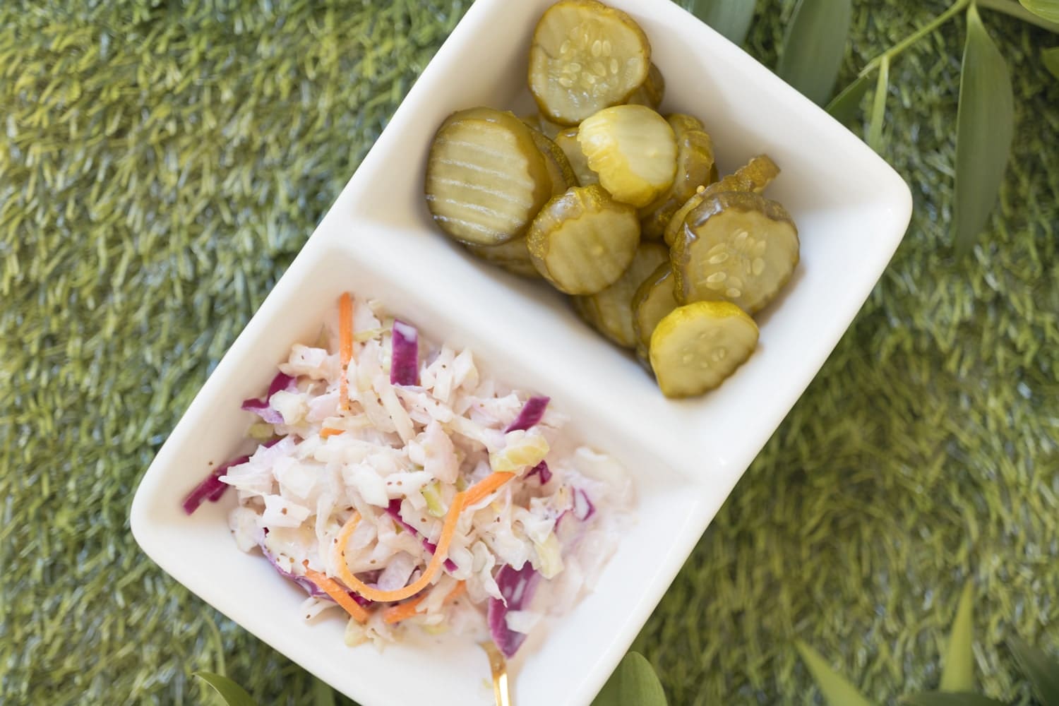 Homemade cole slaw and spicy maple bourbon pickle chips for bourbon pulled pork sliders on Diary of a Debutante