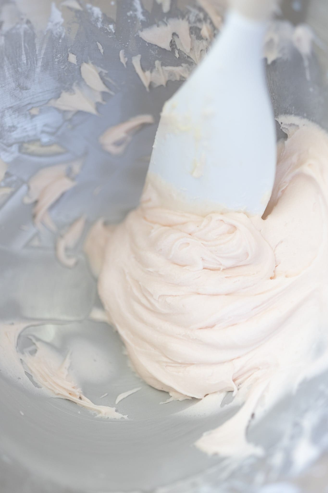 Blogger Stephanie Ziajka shows how to make pink buttercream frosting on Diary of a Debutante